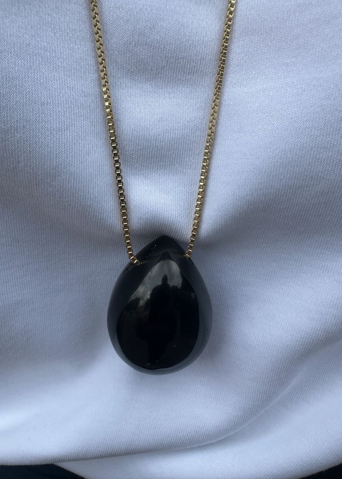 STELLAR WHISPERS Lumi Pendant Necklace - Obsidian Gold