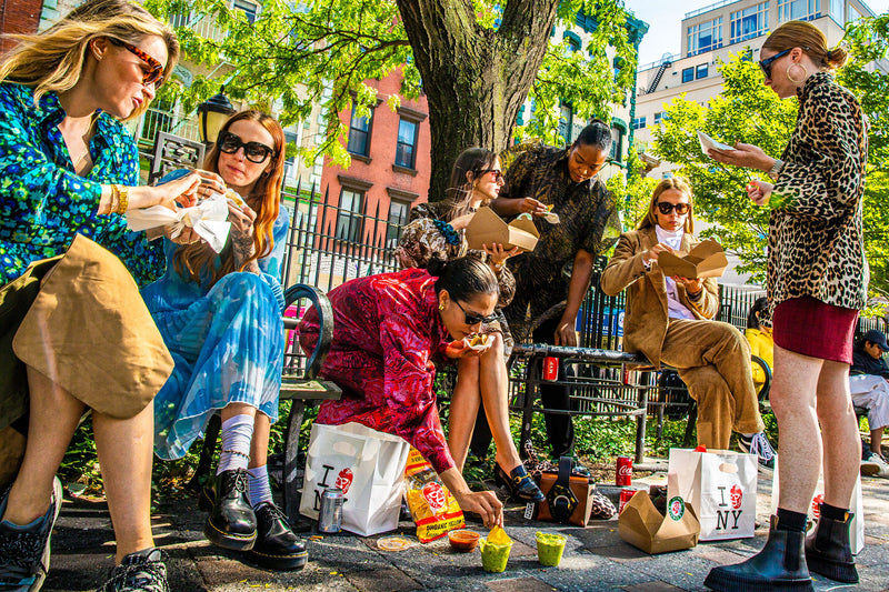 personal stylist wardrobe services by carriage house - photo of women sitting eating lunch on sidewalk in the city